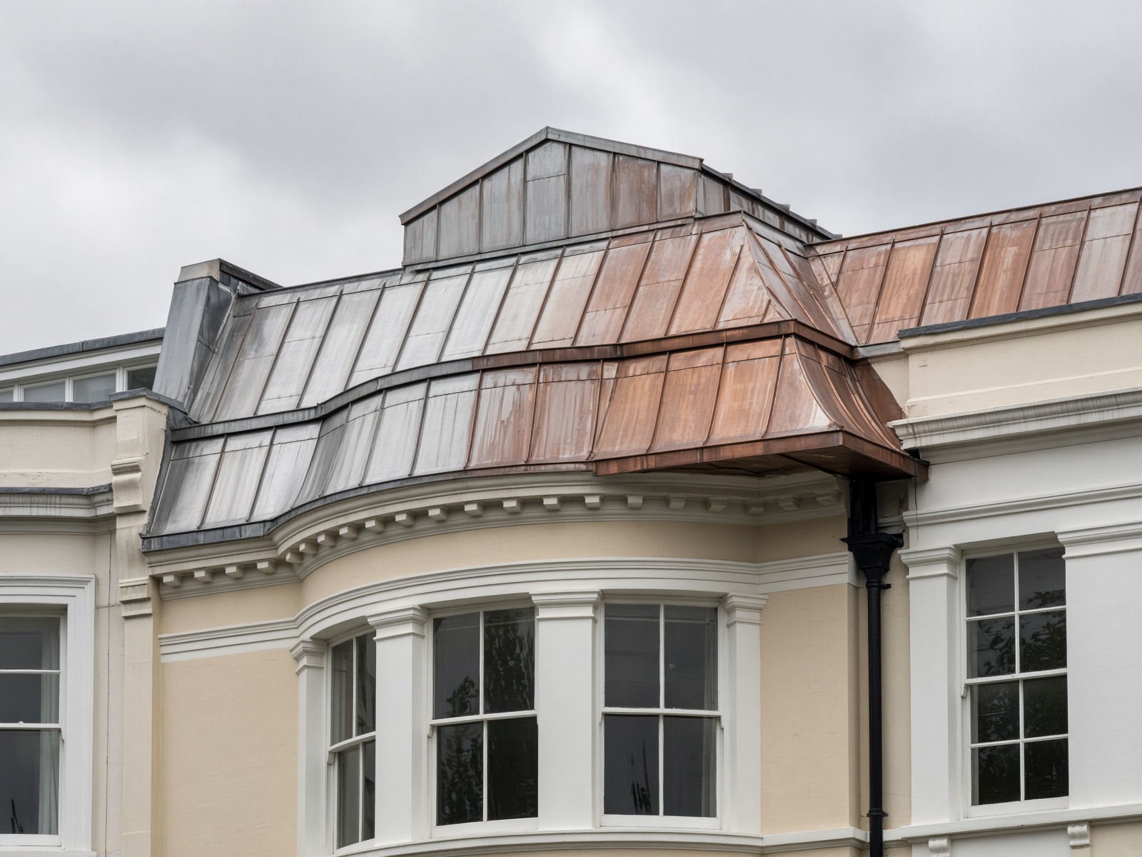 Weathering copper dormer and bay on a London period house